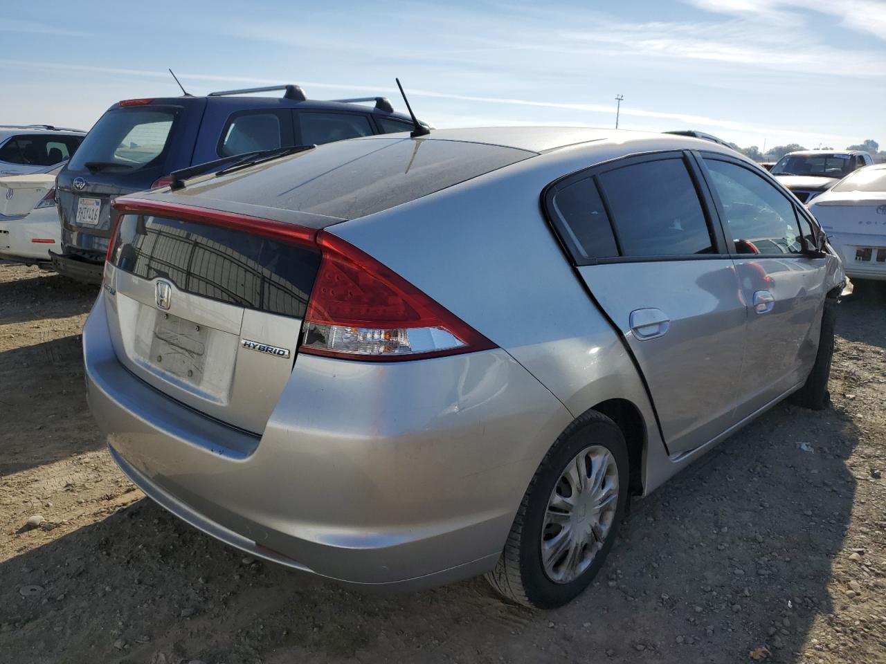 Obraz 3 z Honda Insight Lx 2010 z VIN JHMZE2H56AS022240