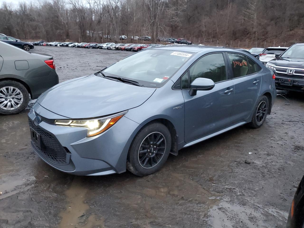 Image 1 of 2021 TOYOTA COROLLA LE 2021 with VIN JTDEAMDE4MJ009686