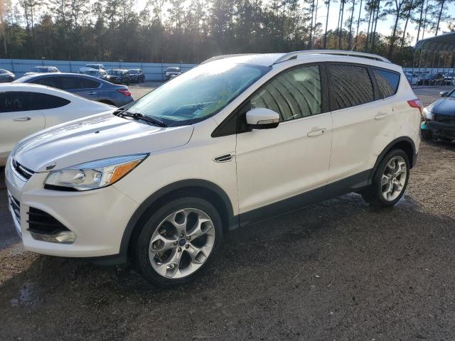 Obraz 1 z 2016 FORD ESCAPE TITANIUM 2016 z VIN 1FMCU0J95GUC66045