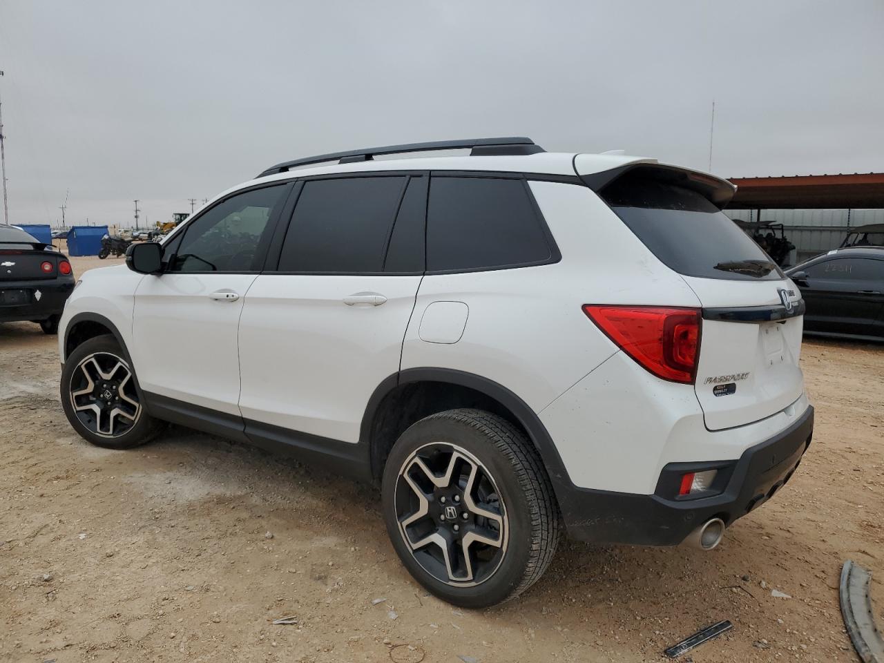 Image 2 of 2023 HONDA PASSPORT ELITE 2023 with VIN 5FNYF8H02PB029855