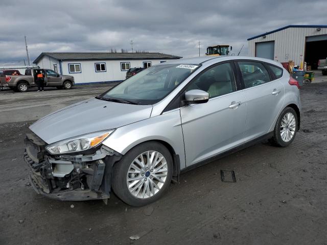 Image 1 of 2015 FORD FOCUS TITANIUM 2015 with VIN 1FADP3N20FL325107