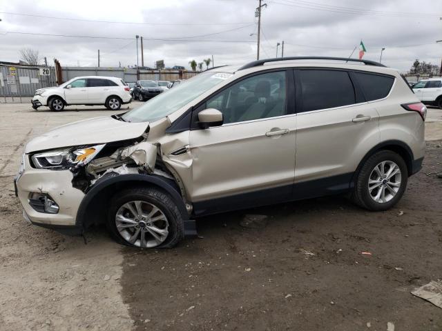 Obraz 1 z 2017 FORD ESCAPE SE 2017 z VIN 1FMCU0G9XHUD44263