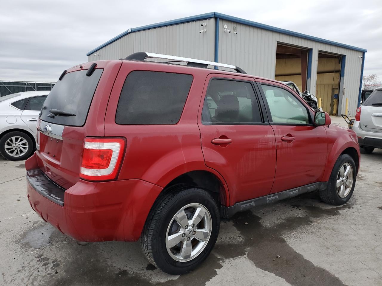 Image 3 of 2011 FORD ESCAPE LIMITED 2011 with VIN 1FMCU0E70BKB09892