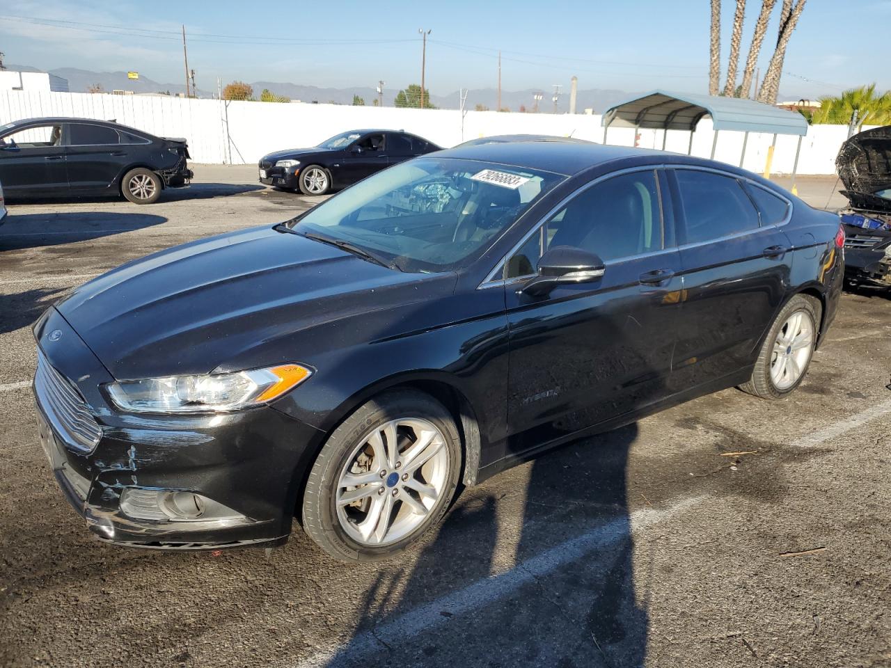 Image 1 of 2014 FORD FUSION SE HYBRID 2014 with VIN 3FA6P0LU7ER306551