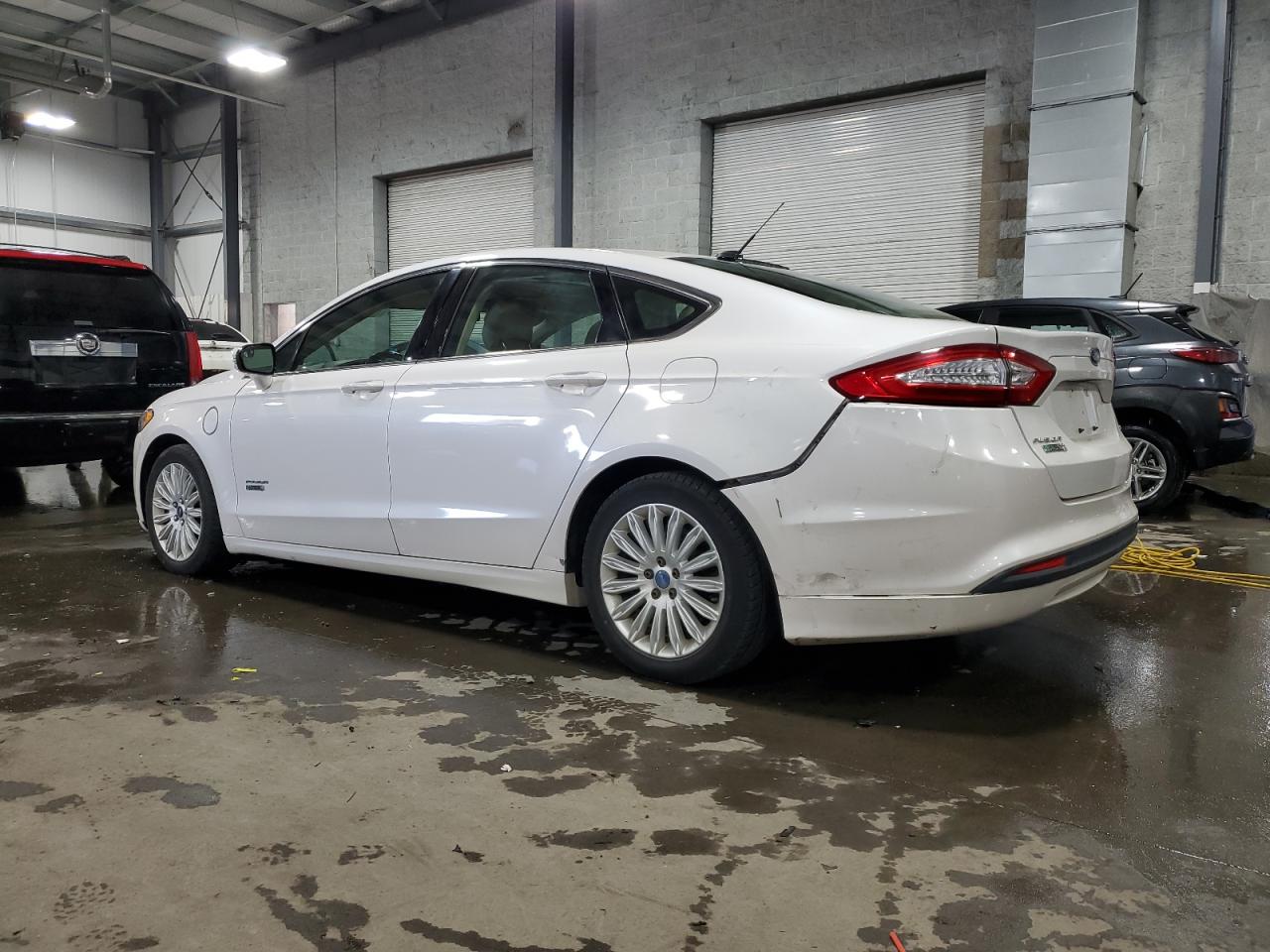 Image 2 of 2013 FORD FUSION SE PHEV 2013 with VIN 3FA6P0PU2DR246851