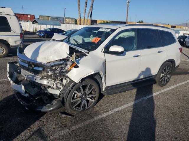 Obraz 1 z 2021 HONDA PILOT TOURING 2021 z VIN 5FNYF5H93MB021000