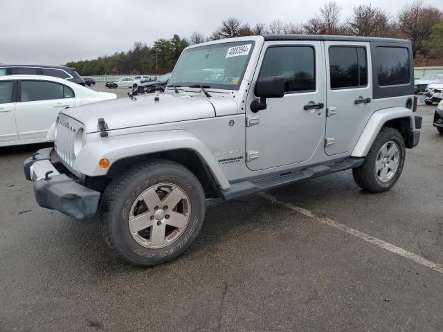 Image 1 of 2012 JEEP WRANGLER UNLIMITED SAHARA 2012 with VIN 1C4HJWEG7CL202166