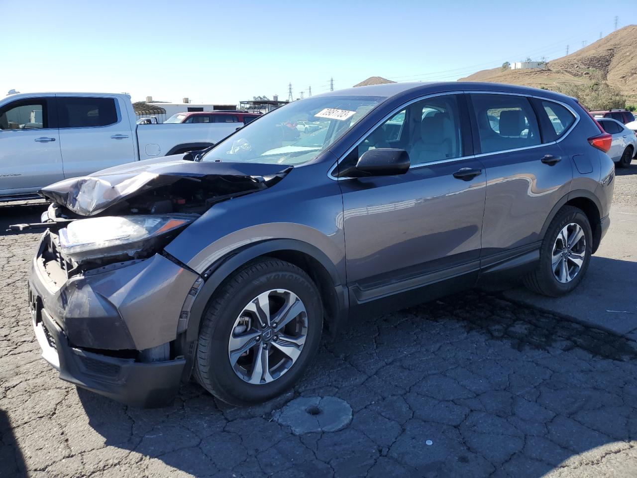 Obraz 1 z 2017 HONDA CR-V LX 2017 z VIN 7FARW5H3XHE006486