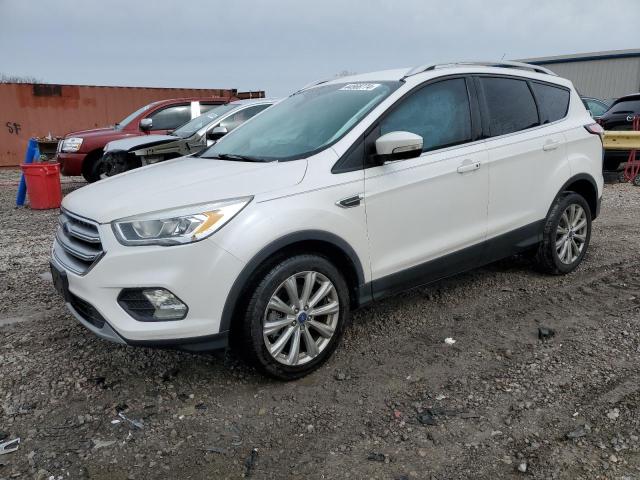 Image 1 of 2017 FORD ESCAPE TITANIUM 2017 with VIN 1FMCU0J99HUE93689