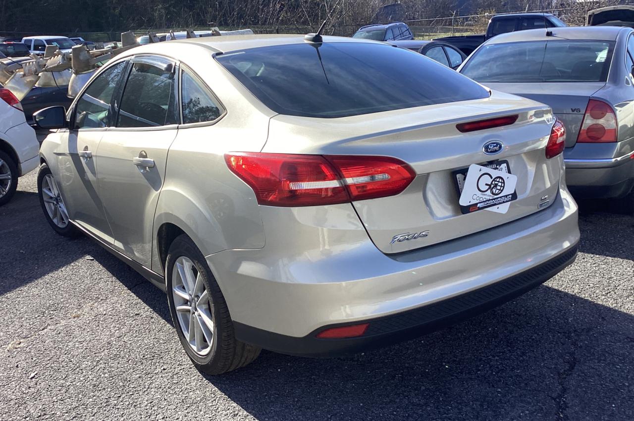 Image 3 of 2018 FORD FOCUS SE 2018 with VIN 1FADP3FE3JL214634