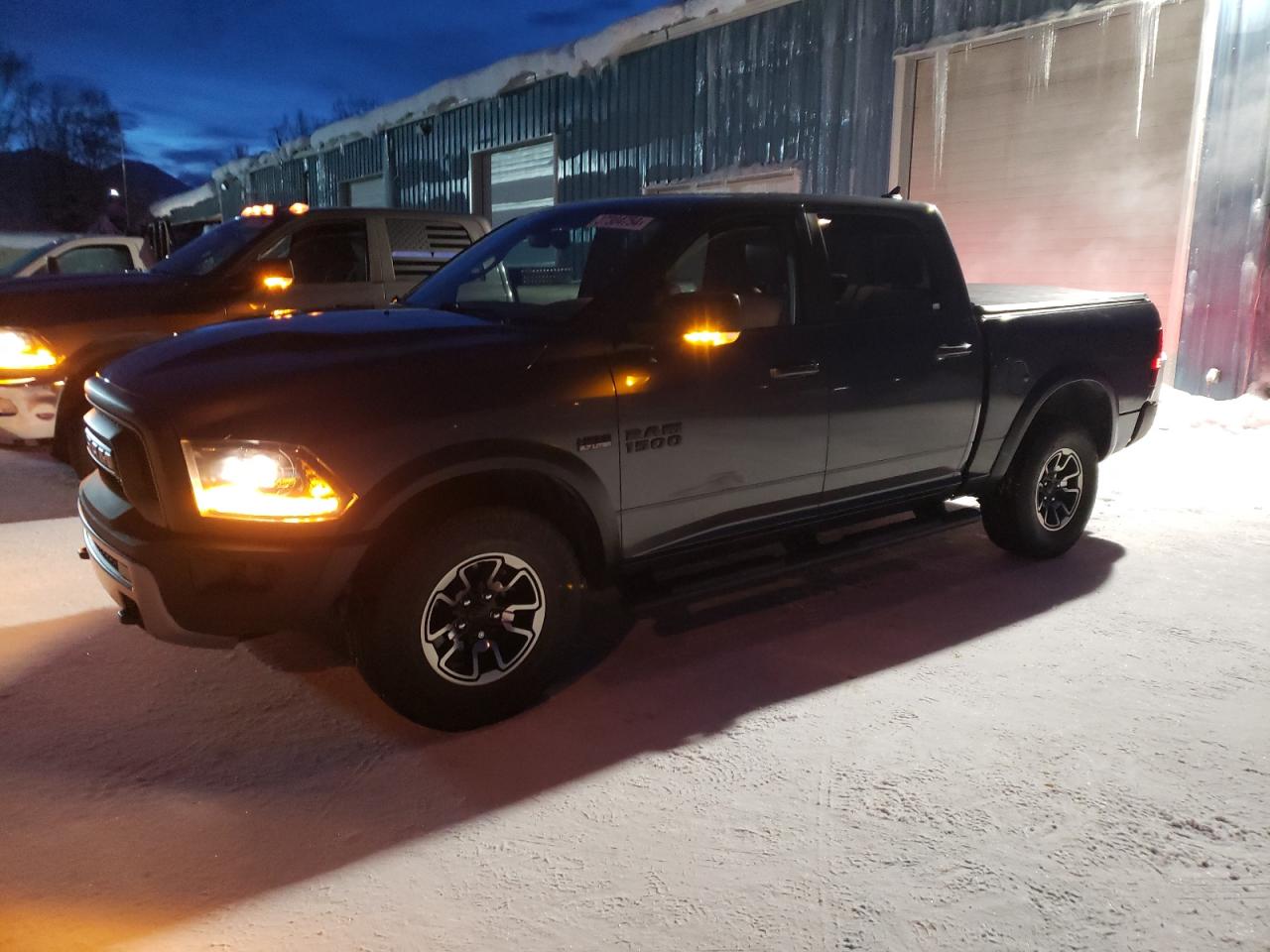 Image 1 of 2018 RAM 1500 REBEL 2018 with VIN 1C6RR7YT7JS110805