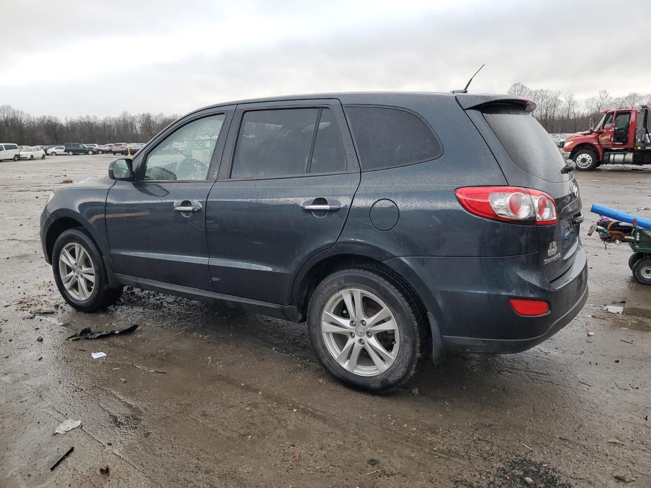 Image 2 of 2012 HYUNDAI SANTA FE LIMITED 2012 with VIN 5XYZKDAG7CG166521