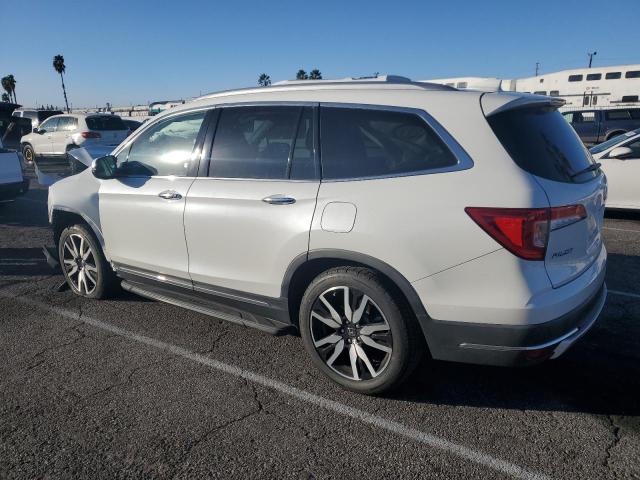 Obraz 2 z 2021 HONDA PILOT TOURING 2021 z VIN 5FNYF5H93MB021000