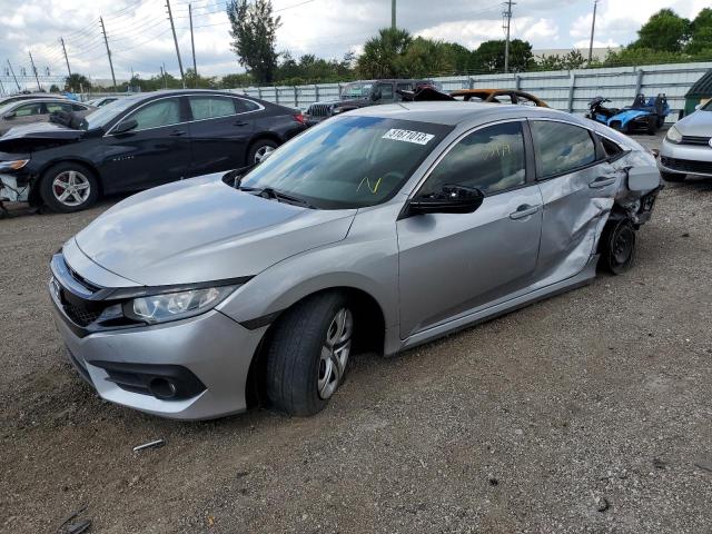 Изображение 1 2019 HONDA CIVIC LX 2019 с VIN 19XFC2F56JE028653