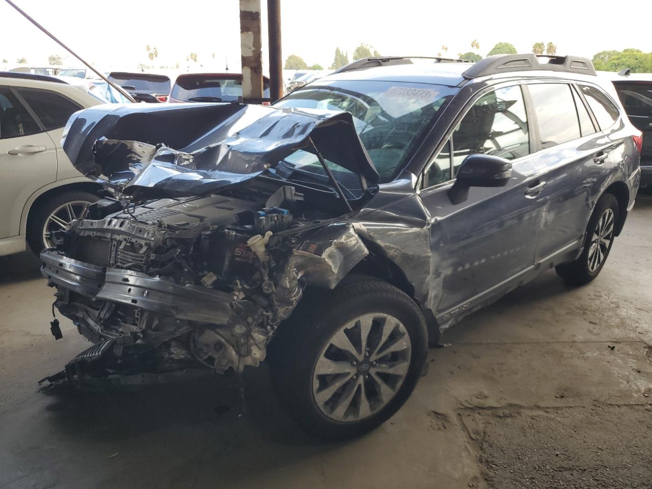 Image 1 of 2015 SUBARU OUTBACK 3.6R LIMITED 2015 with VIN 4S4BSENC7F3312841