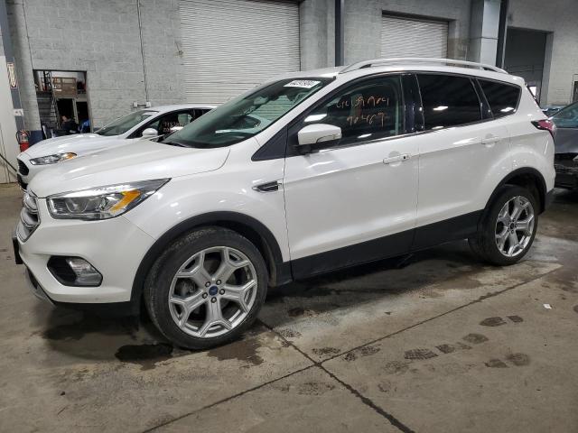 Image 1 of 2017 FORD ESCAPE TITANIUM 2017 with VIN 1FMCU9J91HUB89518