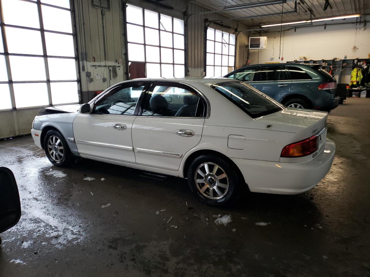Obraz 2 z 2002 KIA OPTIMA MAGENTIS 2002 z VIN KNAGD128725105181