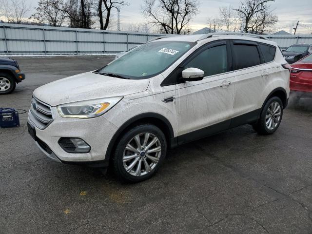 Obraz 1 z 2017 FORD ESCAPE TITANIUM 2017 z VIN 1FMCU9J9XHUB76606