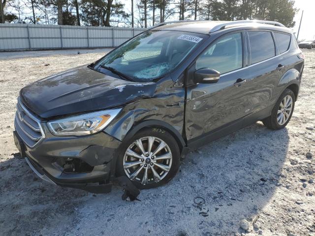 Image 1 of 2017 FORD ESCAPE TITANIUM 2017 with VIN 1FMCU0J93HUE42933