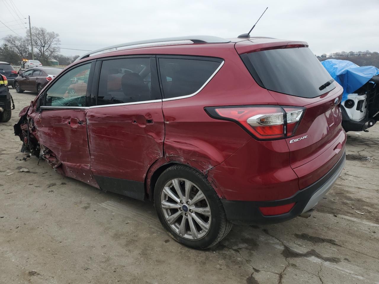Obraz 2 z 2017 FORD ESCAPE TITANIUM 2017 z VIN 1FMCU0J9XHUD31991