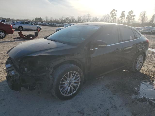Image 1 of 2014 FORD FOCUS TITANIUM 2014 with VIN 1FADP3J26EL357449