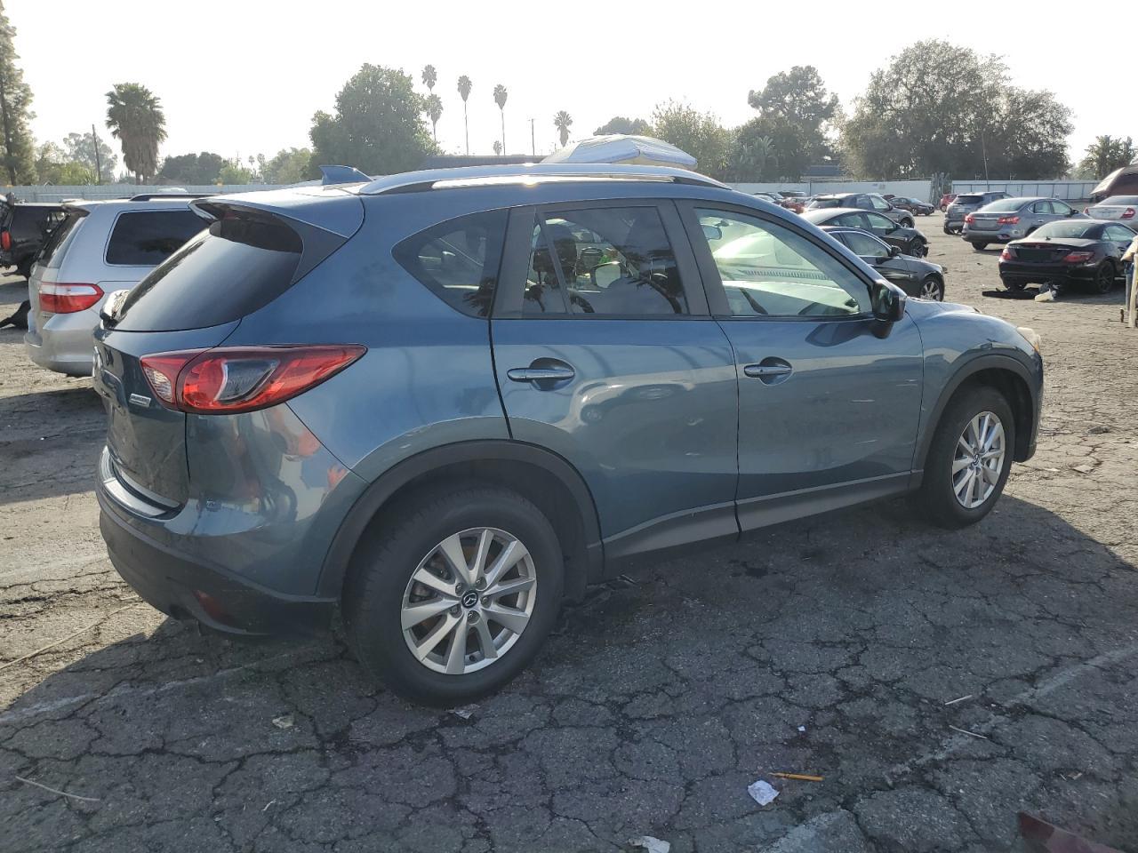 Obraz 3 z 2015 MAZDA CX-5 TOURING 2015 z VIN JM3KE2CYXF0476344