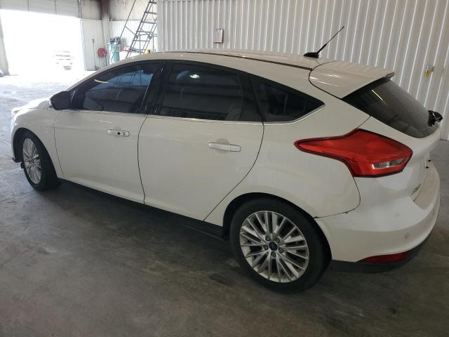 Изображение 2 2016 FORD FOCUS TITANIUM 2016 с VIN 1FADP3N20GL287881