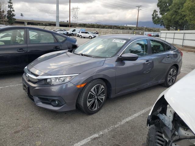 Изображение 1 2017 HONDA CIVIC EXL 2017 с VIN 2HGFC1F79HH641684