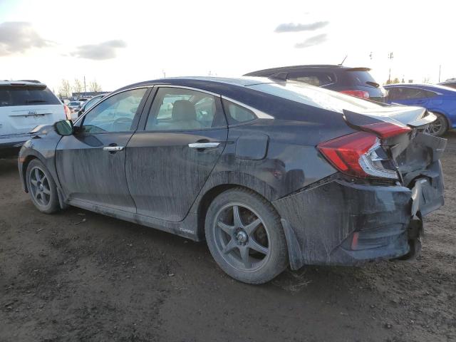 Obraz 2 z 2017 HONDA CIVIC TOURING 2017 z VIN 2HGFC1F94HH104898