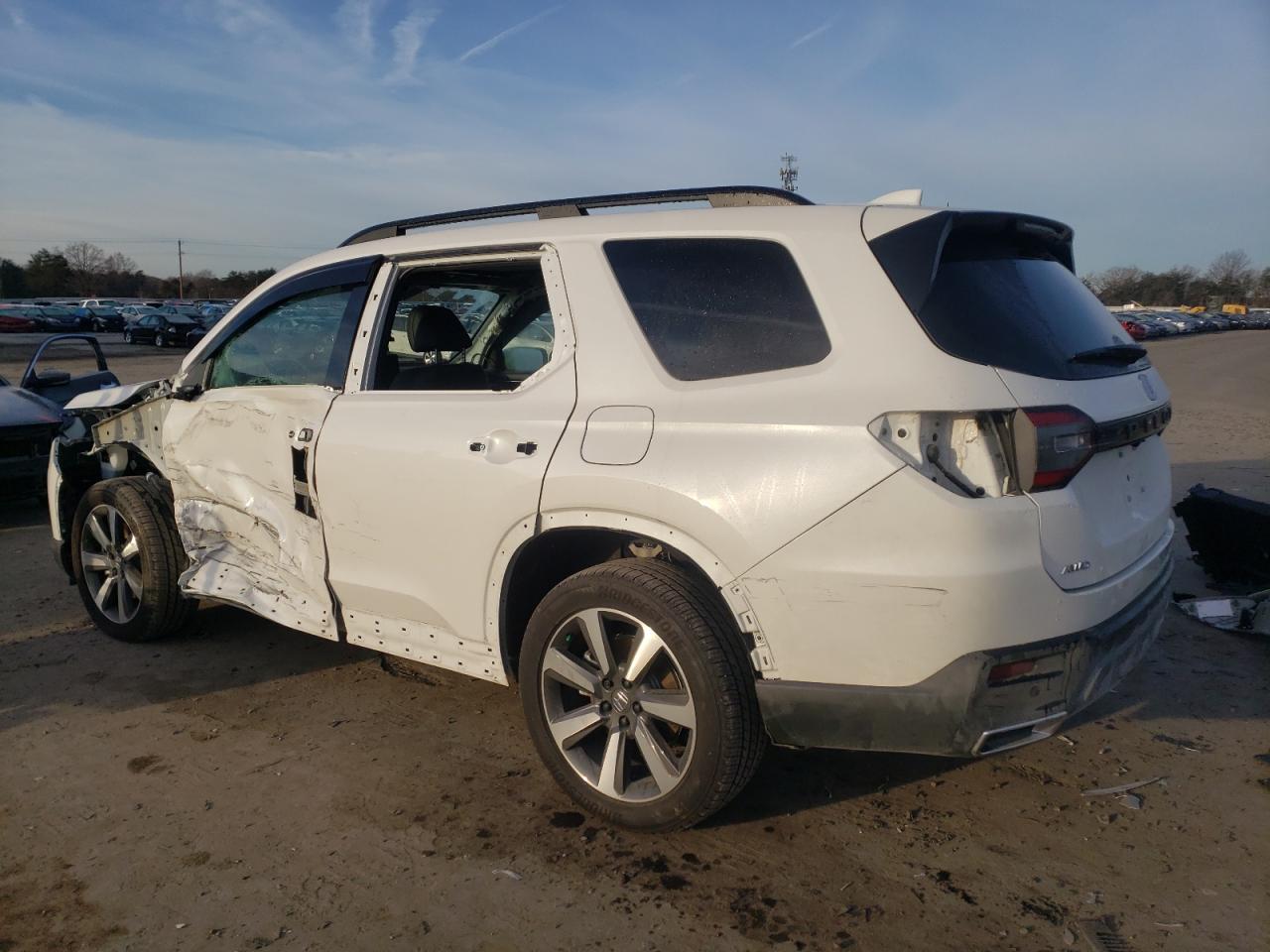 Изображение 2 2023 HONDA PILOT TOURING 2023 с VIN 5FNYG1H73PB001760