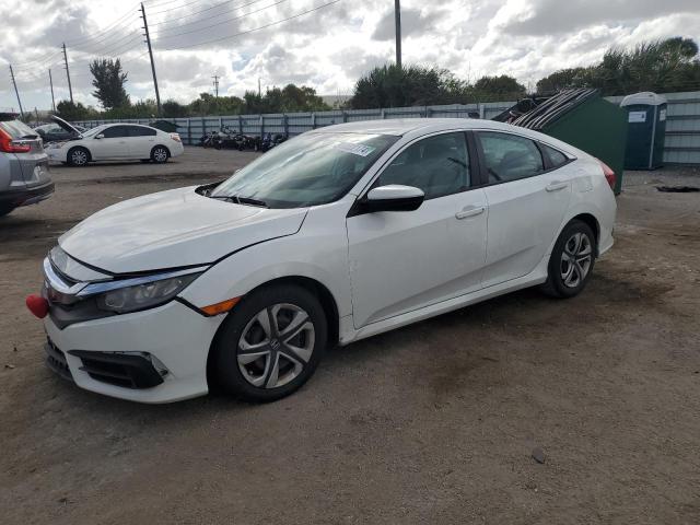 Obraz 1 z 2018 HONDA CIVIC LX 2018 z VIN 19XFC2F55JE032967