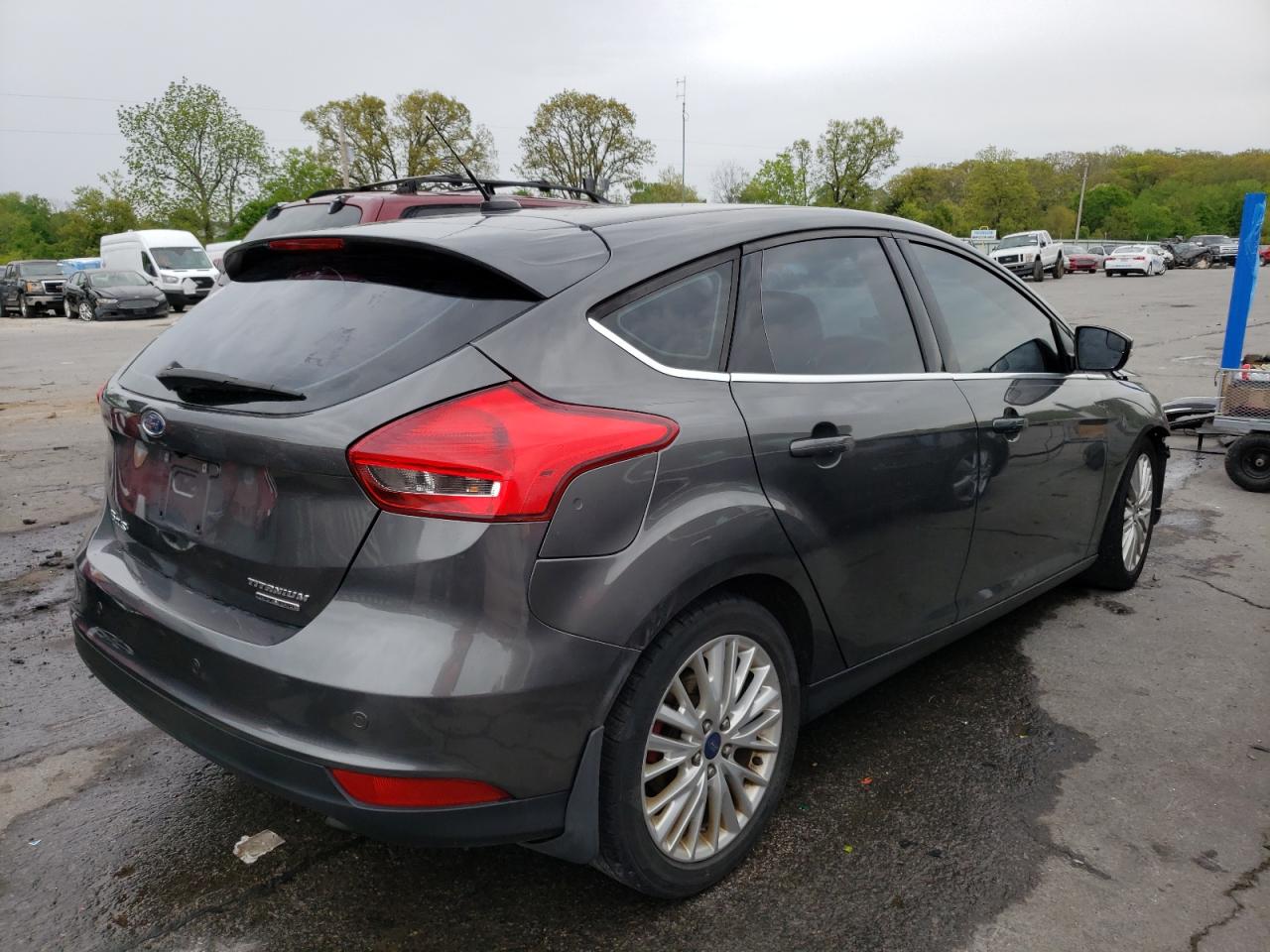 Image 3 of 2015 FORD FOCUS TITANIUM 2015 with VIN 1FADP3N21FL228448