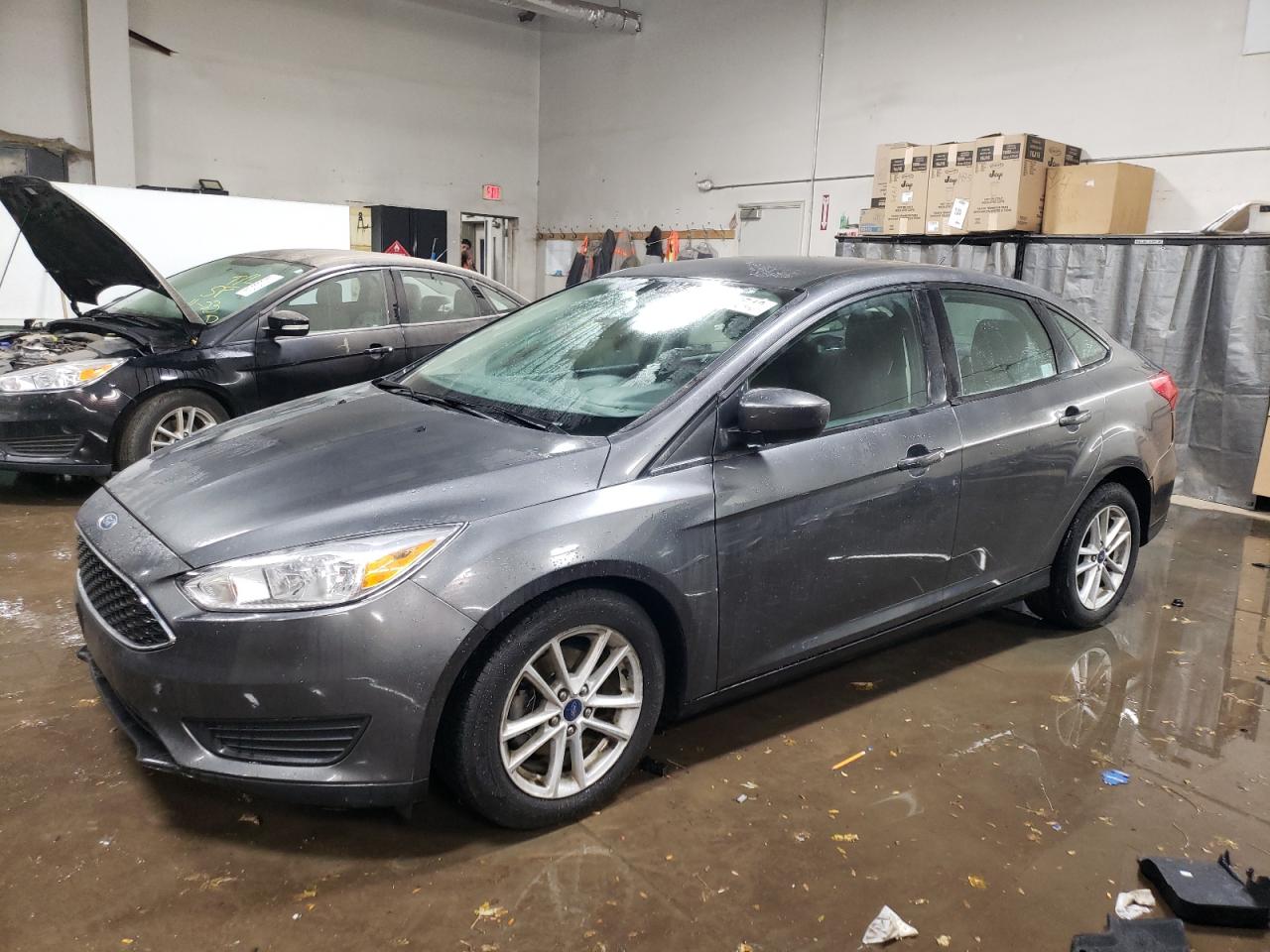 Image 1 of 2018 FORD FOCUS SE 2018 with VIN 1FADP3FE3JL300574