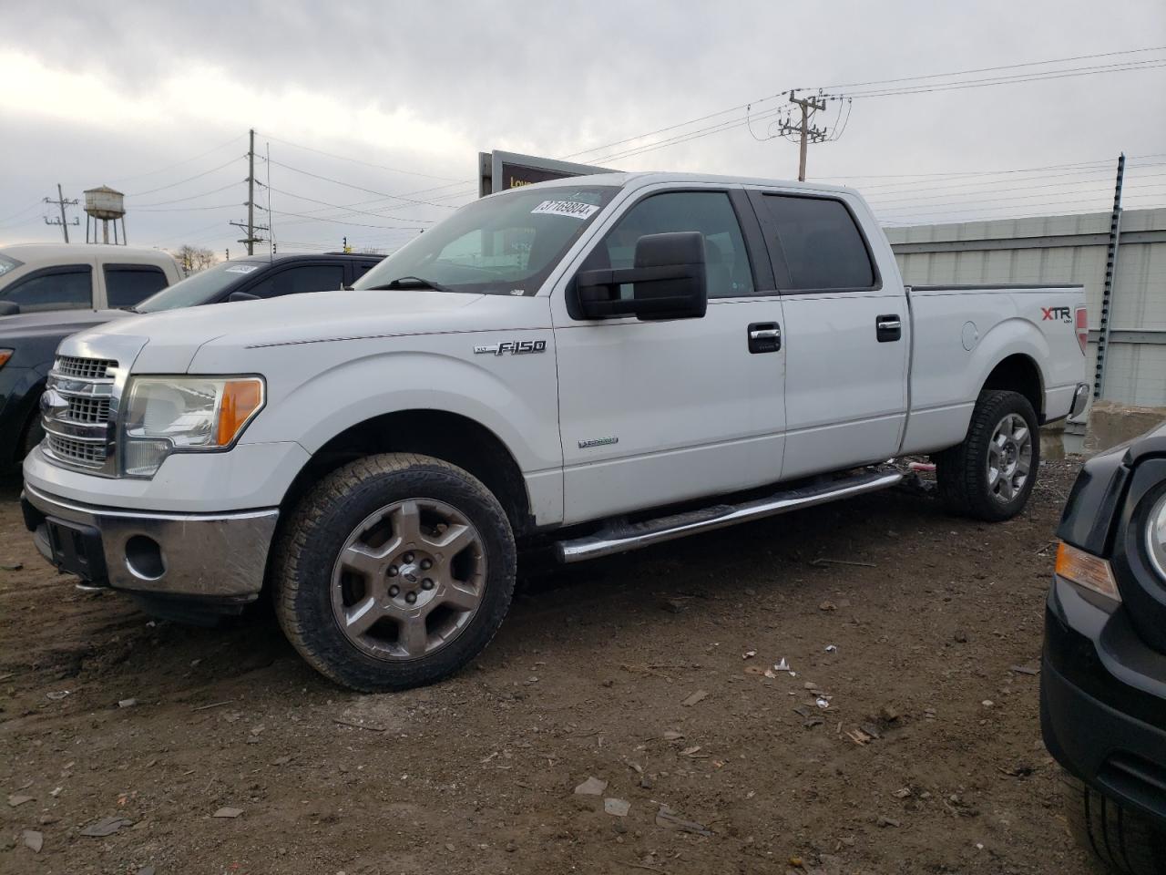 Image 1 of 2014 FORD F150 SUPERCREW 2014 with VIN 1FTFW1ET2EFA01561