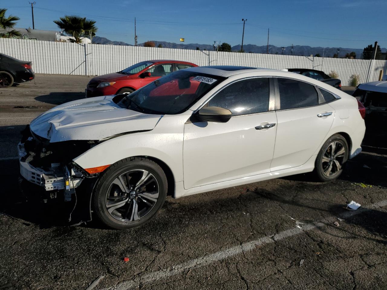 Obraz 1 z 2017 HONDA CIVIC TOURING 2017 z VIN 2HGFC1F99HH637118