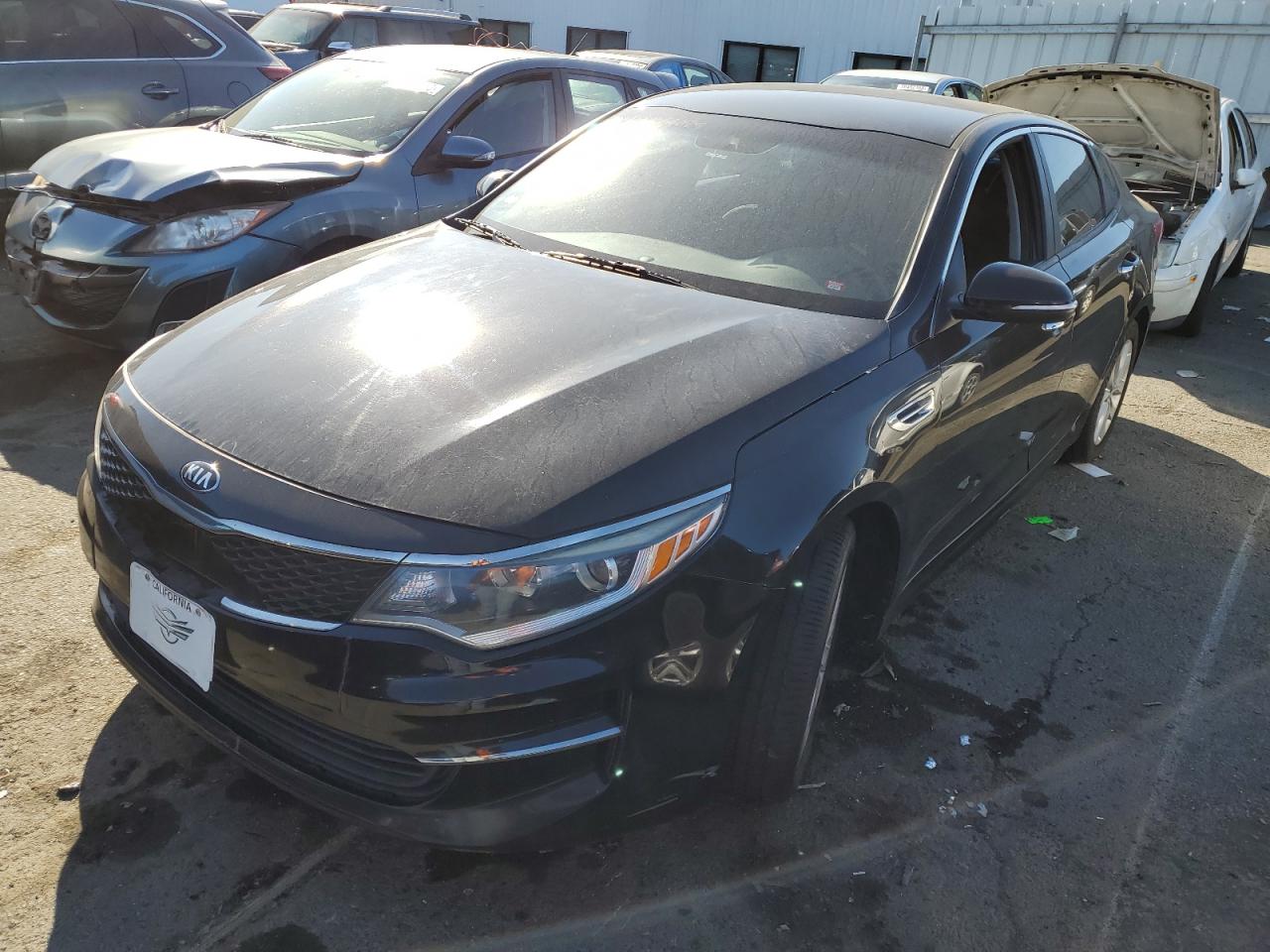 Image 1 of 2016 KIA OPTIMA LX 2016 with VIN 5XXGT4L34GG059323