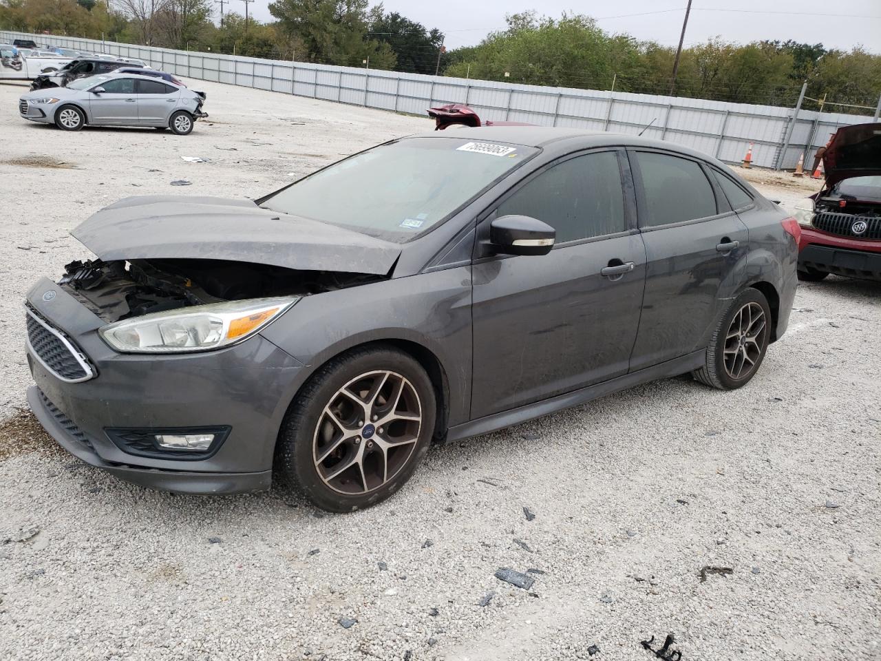 Image 1 of 2015 FORD FOCUS SE 2015 with VIN 1FADP3F28FL340615