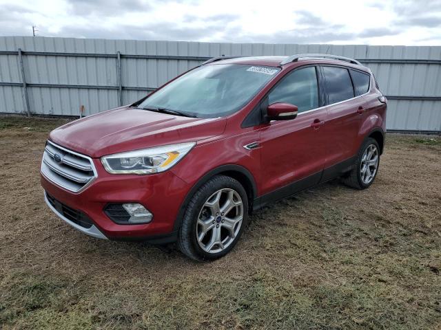Obraz 1 z 2017 FORD ESCAPE TITANIUM 2017 z VIN 1FMCU9J95HUA27228