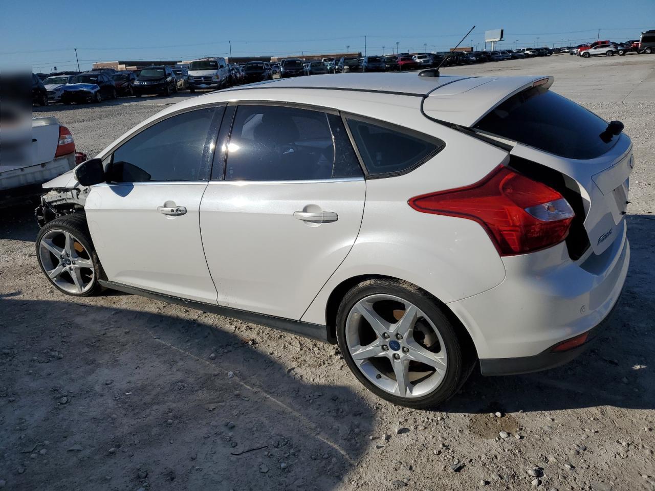 Image 2 of 2012 FORD FOCUS TITANIUM 2012 with VIN 1FAHP3N22CL365654