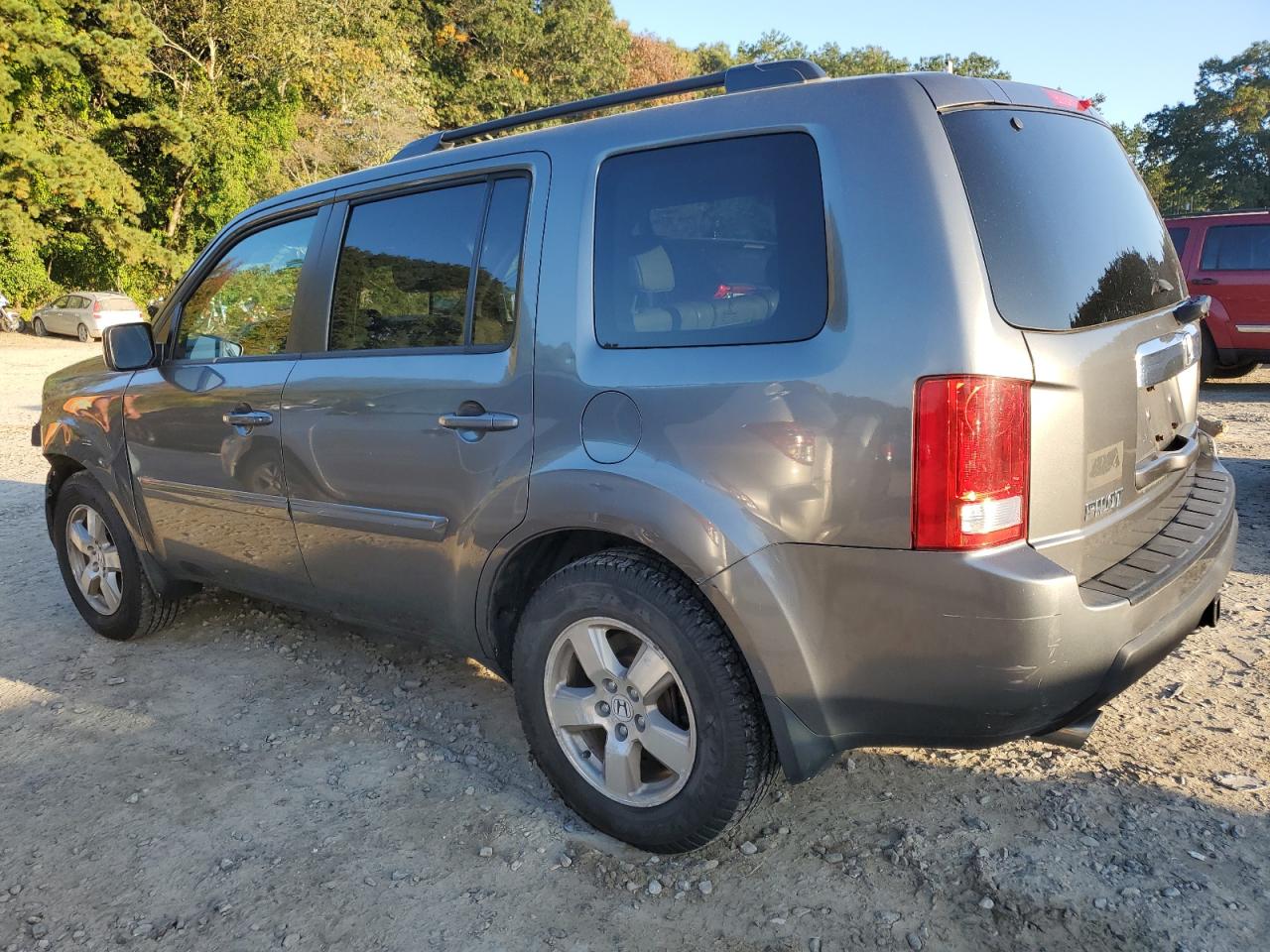 Изображение 2 Honda Pilot Exln 2011 с VIN 5FNYF4H70BB060374