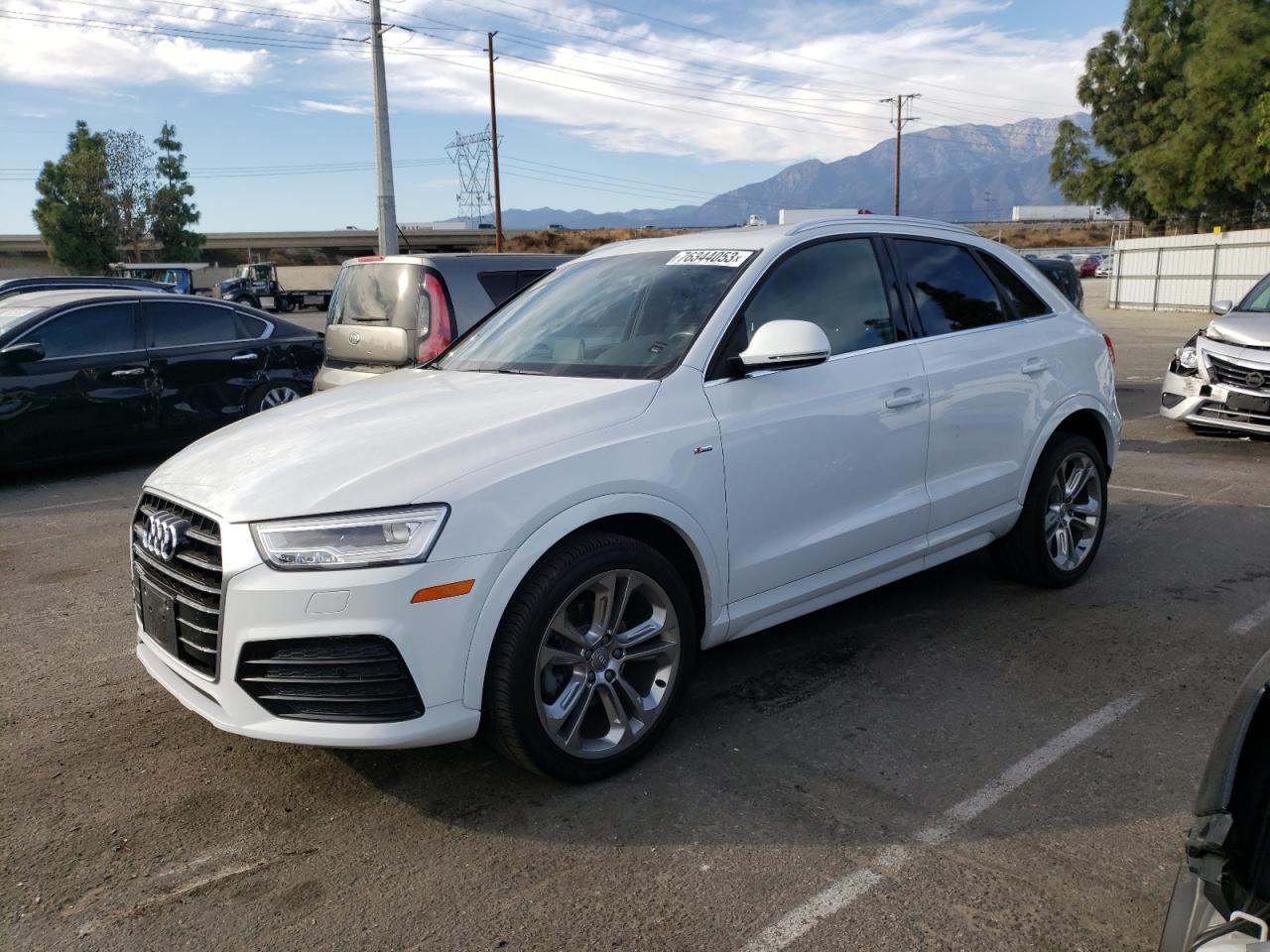 Image 1 of 2018 AUDI Q3 PREMIUM PLUS 2018 with VIN WA1JCCFS1JR007746