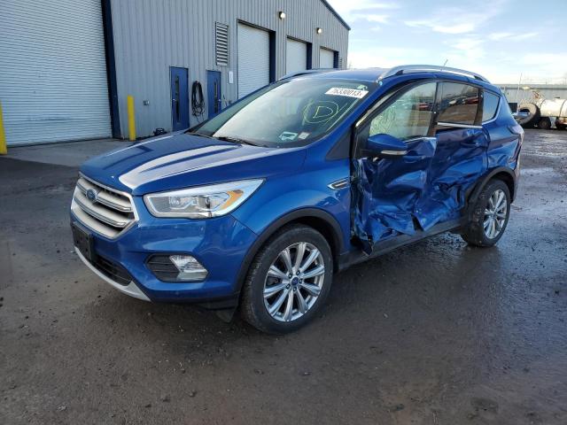 Image 1 of 2017 FORD ESCAPE TITANIUM 2017 with VIN 1FMCU9J98HUA47389