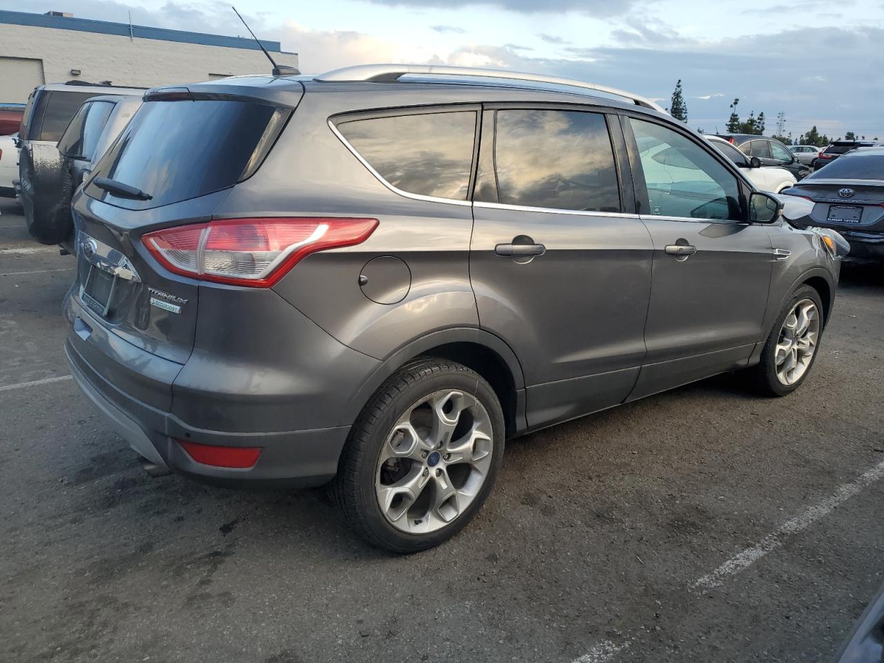 Изображение 3 2014 FORD ESCAPE TITANIUM 2014 с VIN 1FMCU0J96EUA30100