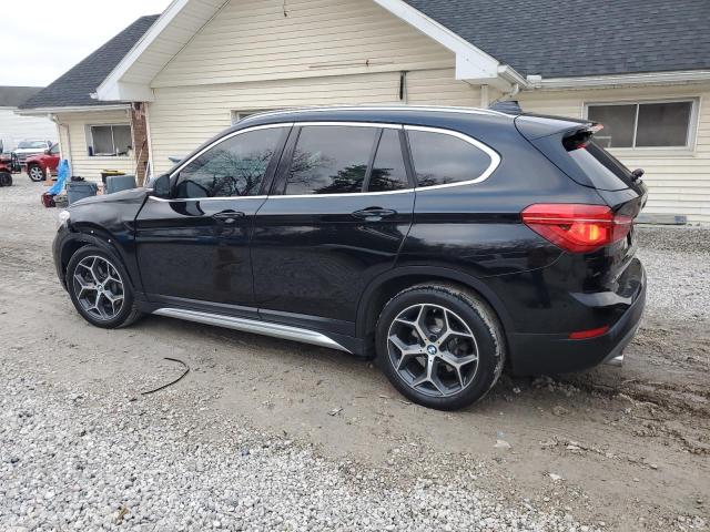 Obraz 2 z 2018 BMW X1 XDRIVE28I 2018 z VIN WBXHT3C38J5L30395