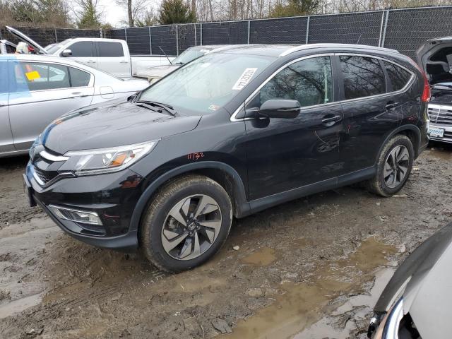 Obraz 1 z 2015 HONDA CR-V TOURING 2015 z VIN 5J6RM4H91FL108506