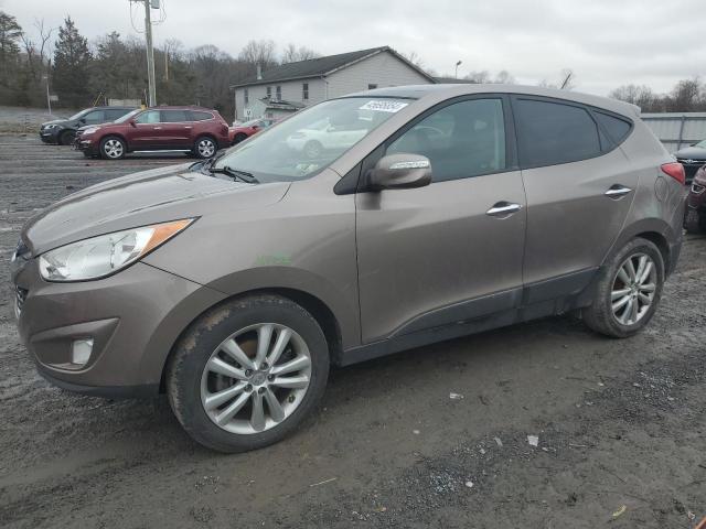 Image 1 of 2011 HYUNDAI TUCSON GLS 2011 with VIN KM8JUCAC1BU179661