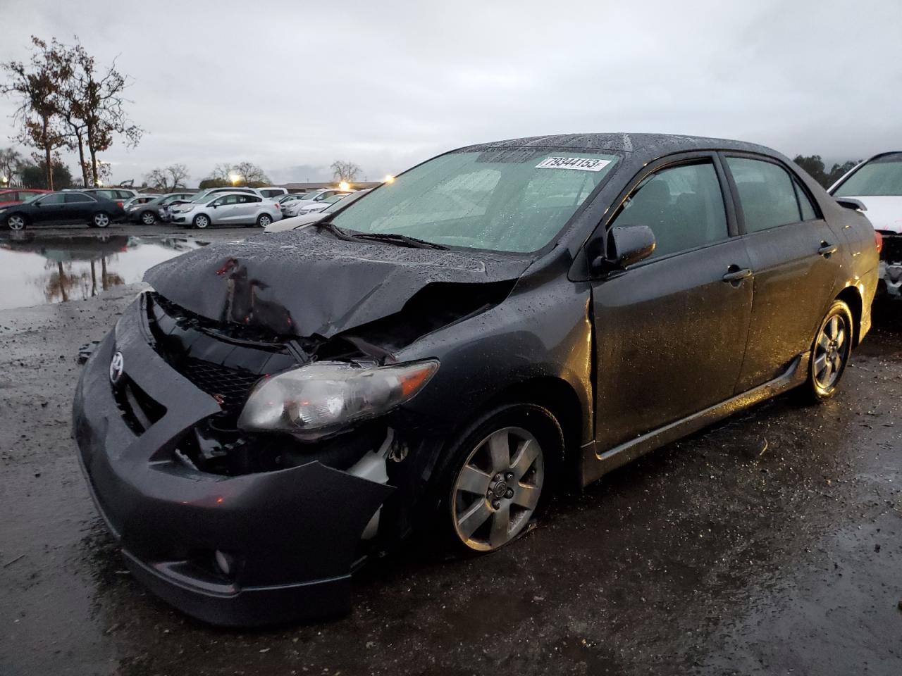 Image 1 of 2009 TOYOTA COROLLA BASE 2009 with VIN 1NXBU40EX9Z048980