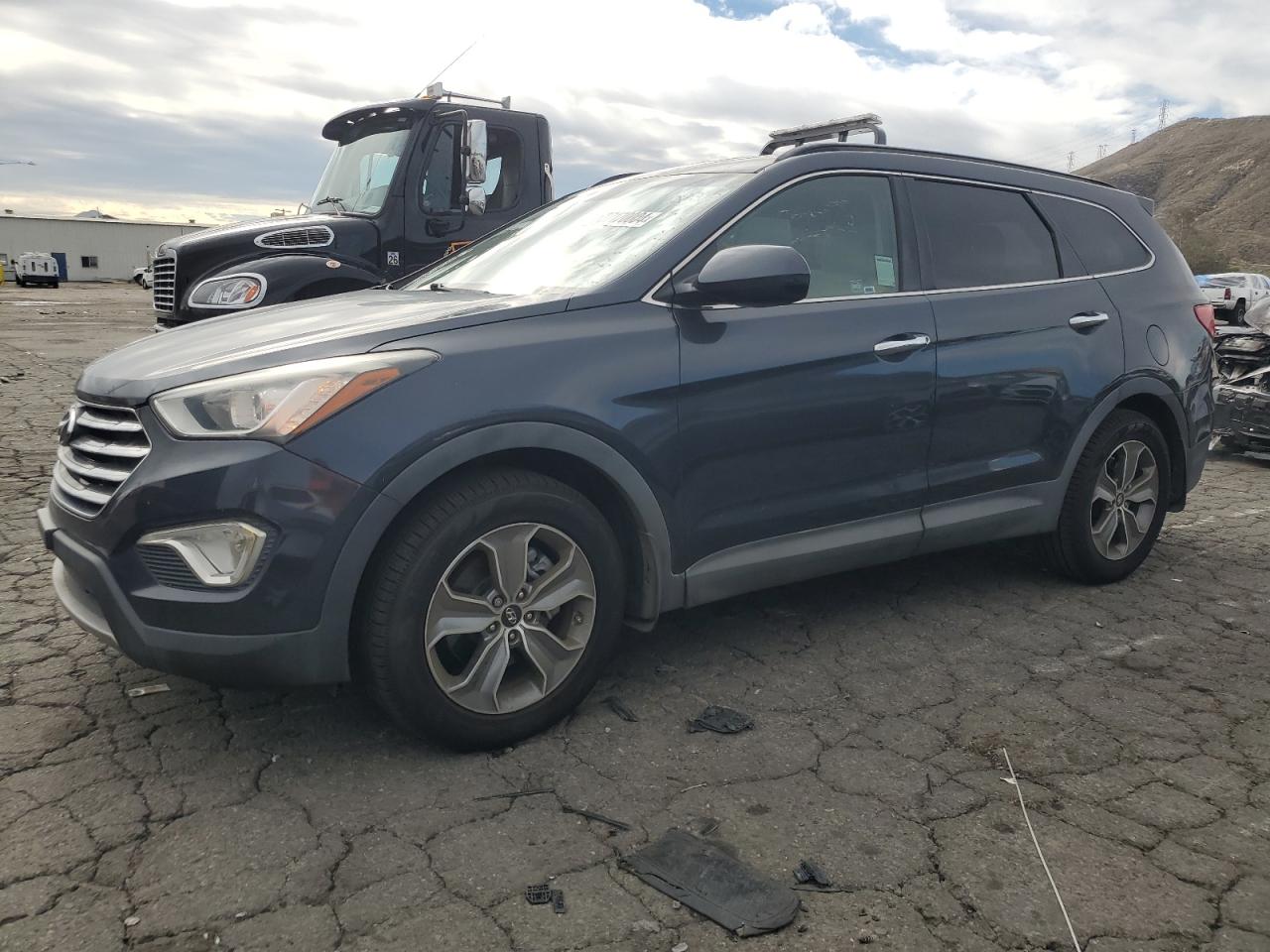 Image 1 of 2016 HYUNDAI SANTA FE SE 2016 with VIN KM8SM4HF9GU148546