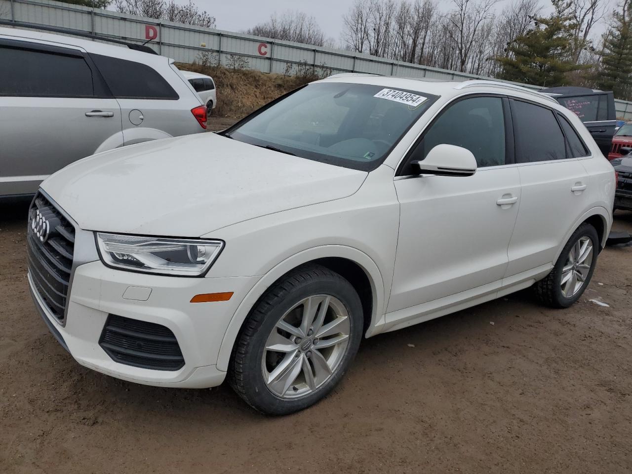 Image 1 of 2016 AUDI Q3 PREMIUM PLUS 2016 with VIN WA1EFCFS1GR012866