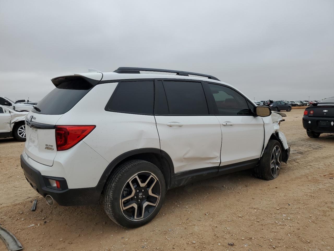 Image 3 of 2023 HONDA PASSPORT ELITE 2023 with VIN 5FNYF8H02PB029855